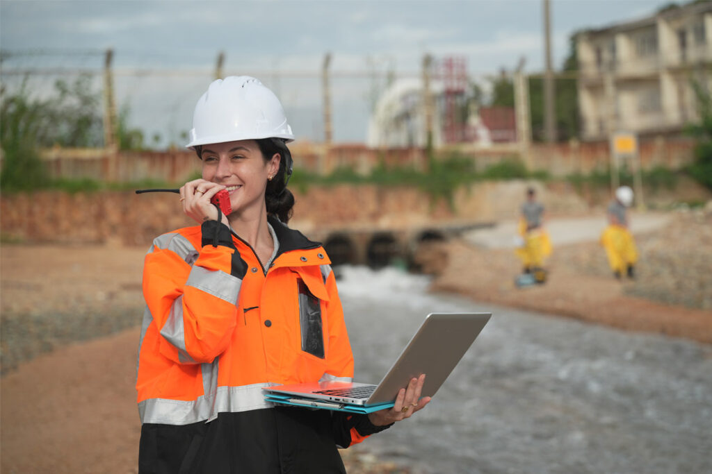 Lead environmental auditor reviewing EMS compliance procedures at an industrial site