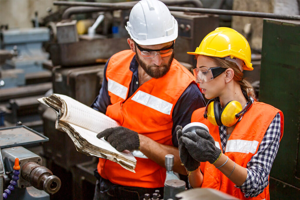 Lead auditor conducting an integrated management system compliance inspection at an industrial facility