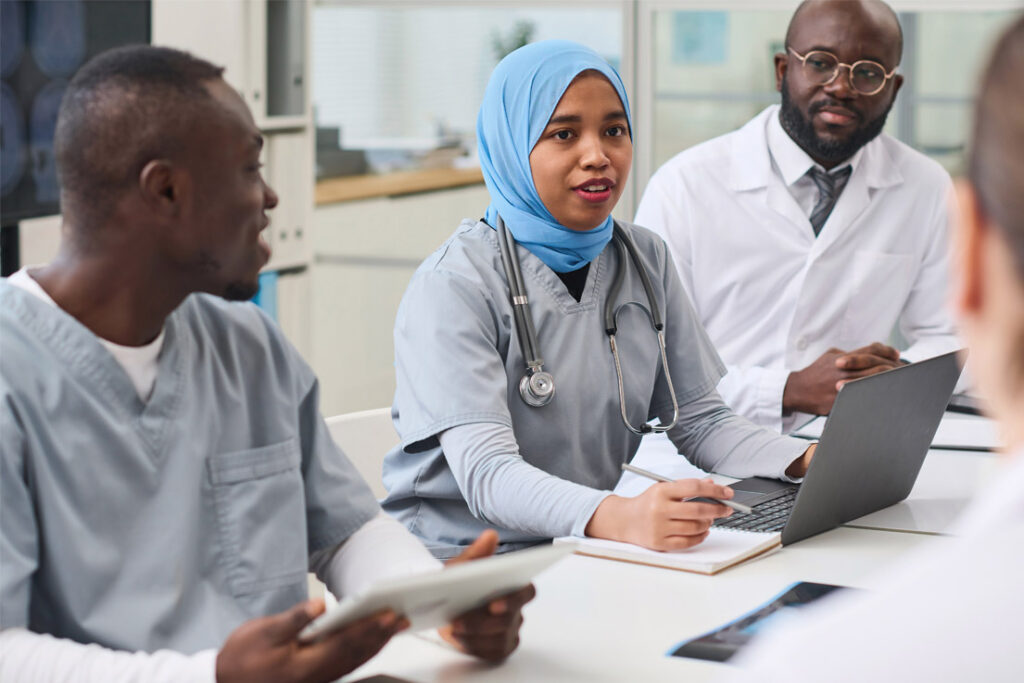 Medical device quality management professionals implementing compliance procedures in a regulated manufacturing environment