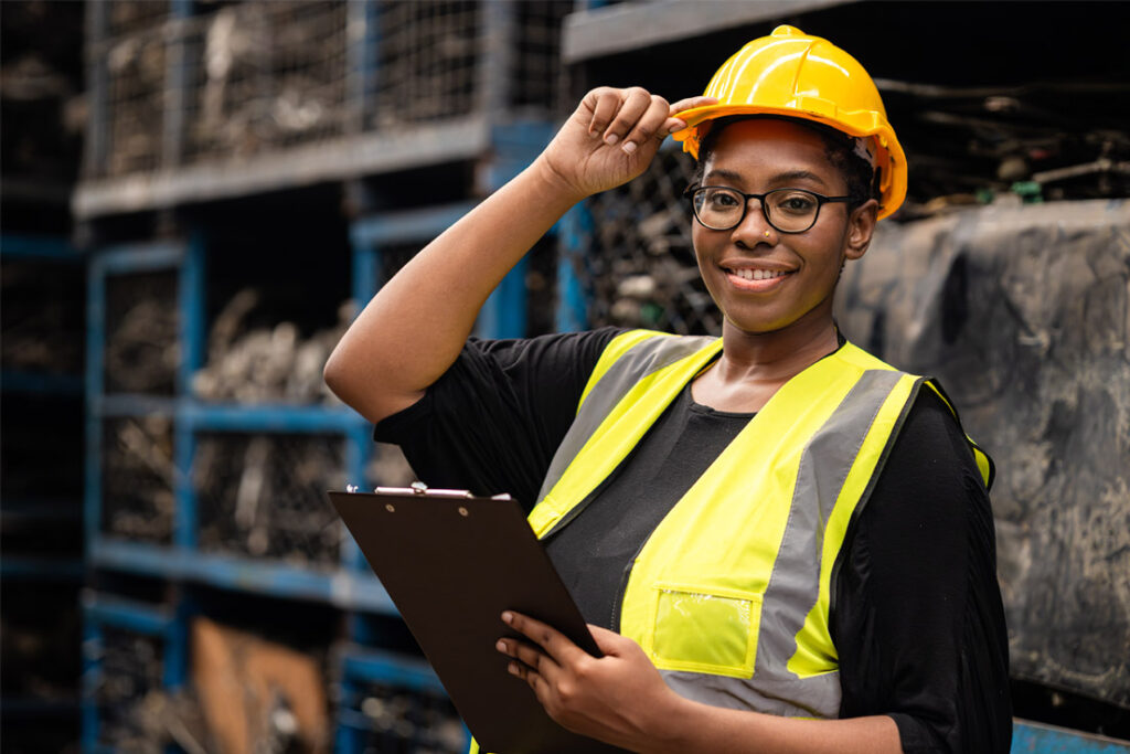 Lead safety auditor reviewing occupational health and safety procedures at an industrial facility