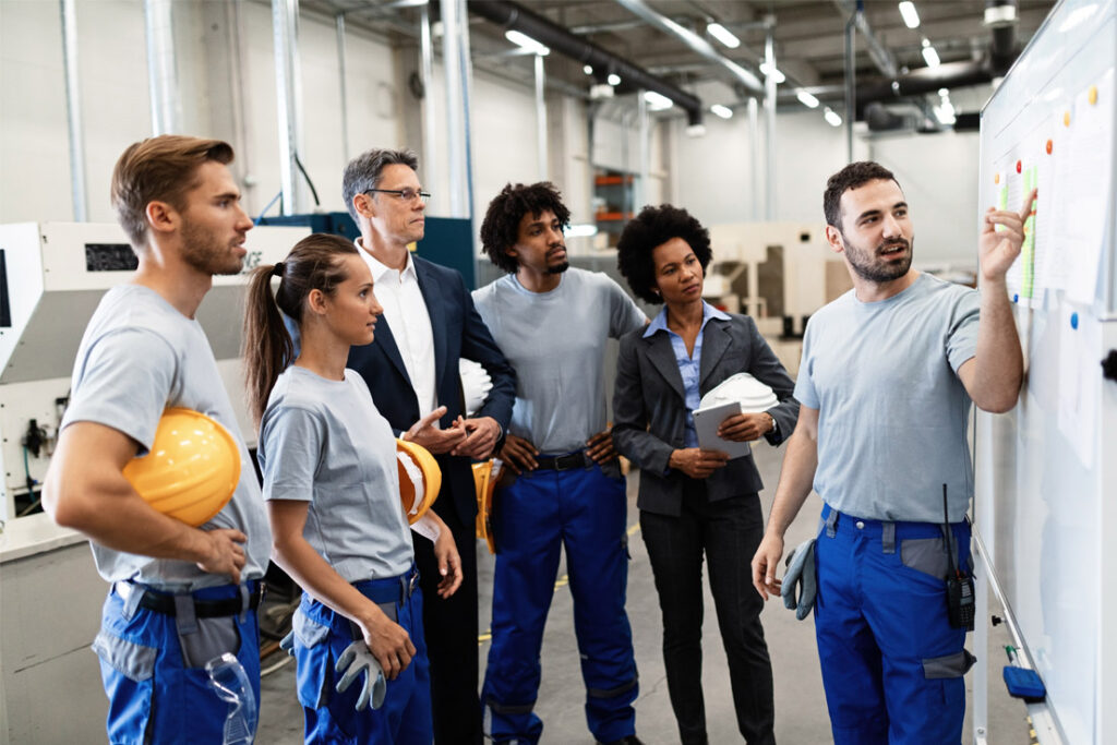Lead quality auditor conducting a compliance inspection in a manufacturing environment